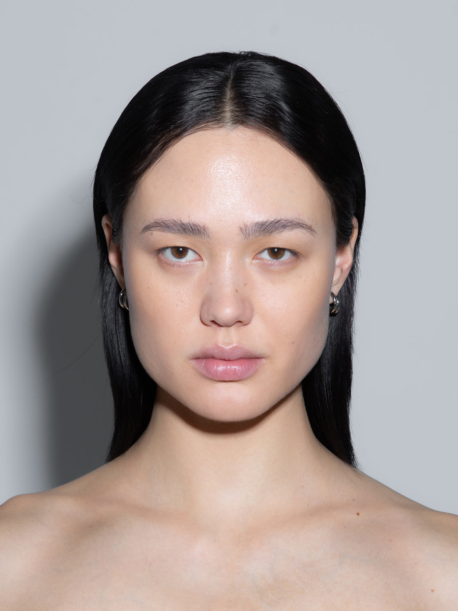 Aeyde | Dean Palladium-Plated Hoop Earrings for Women | Luxury Materials | Handmade in Italy | On Model [x=50,y=50]