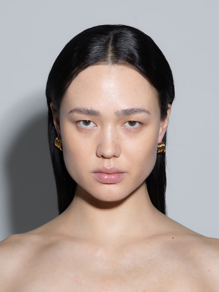 Aeyde | Dillon 18kt Gold-Plated Hoop Earrings for Women | Luxury Materials | Handmade in Italy | On Model [x=50,y=50]