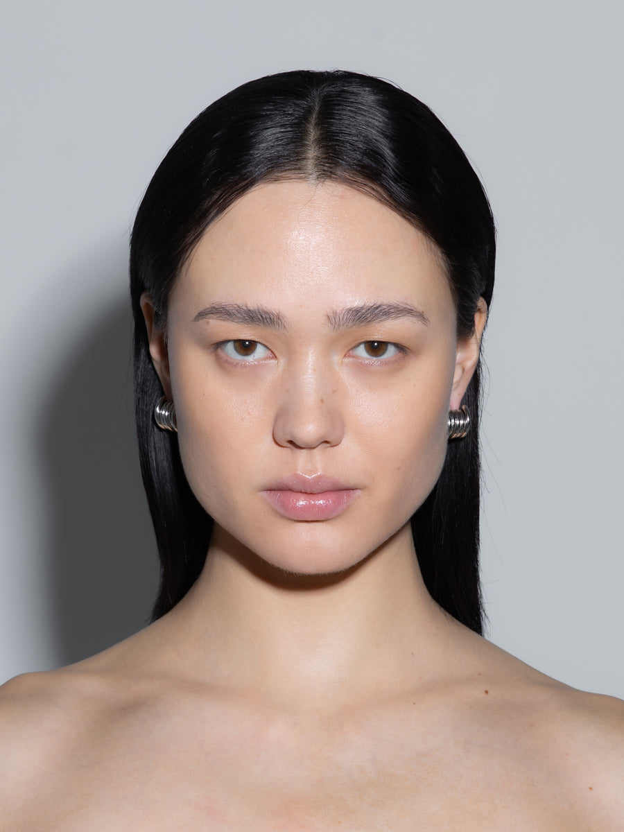 Aeyde | Dillon Palladium-Plated Hoop Earrings for Women | Luxury Materials | Handmade in Italy | On Model [x=50,y=50]