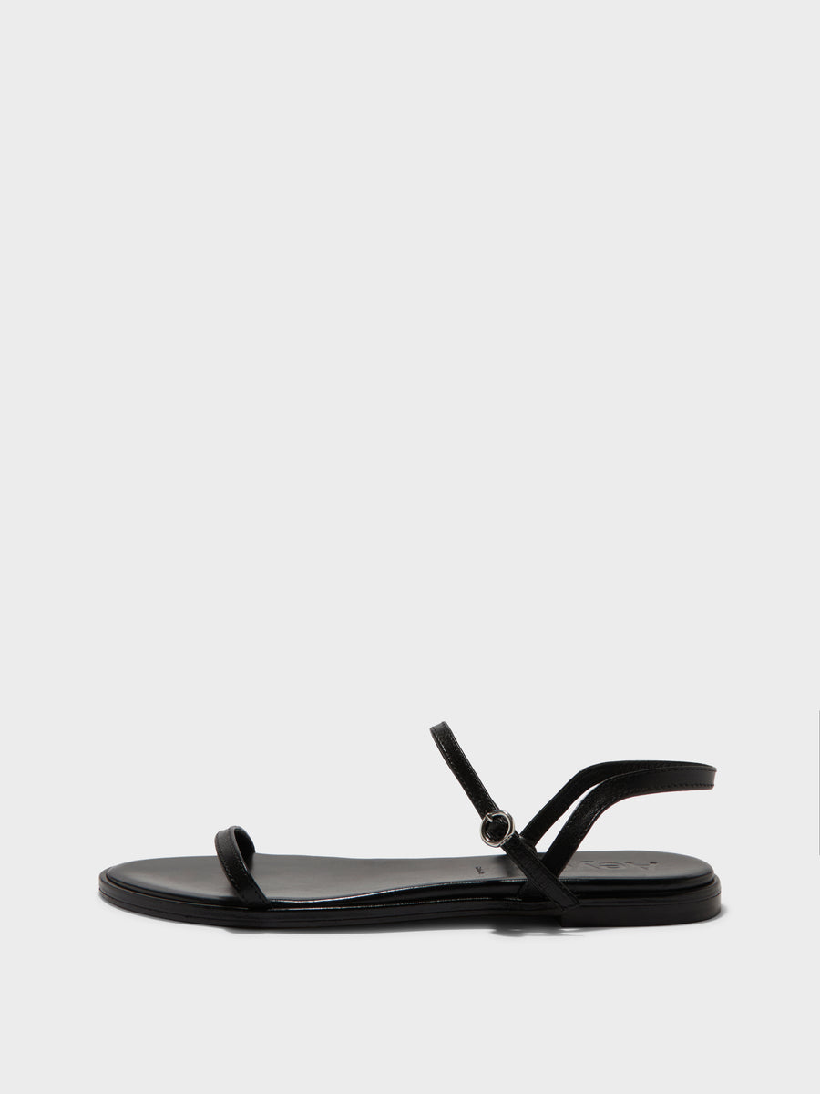 Aeyde | Nettie Leather Flat Sandals for Women | Black Nappa | Round Toe | Flat Heel | Side View [x=50,y=85]