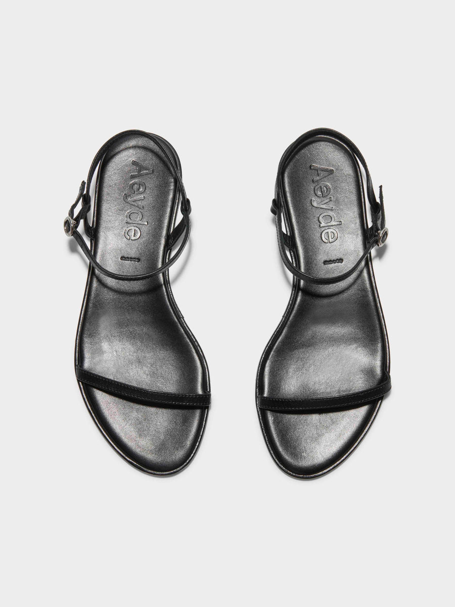 Aeyde | Nettie Leather Flat Sandals for Women | Black Nappa | Round Toe | Flat Heel | Front View [x=50,y=85]