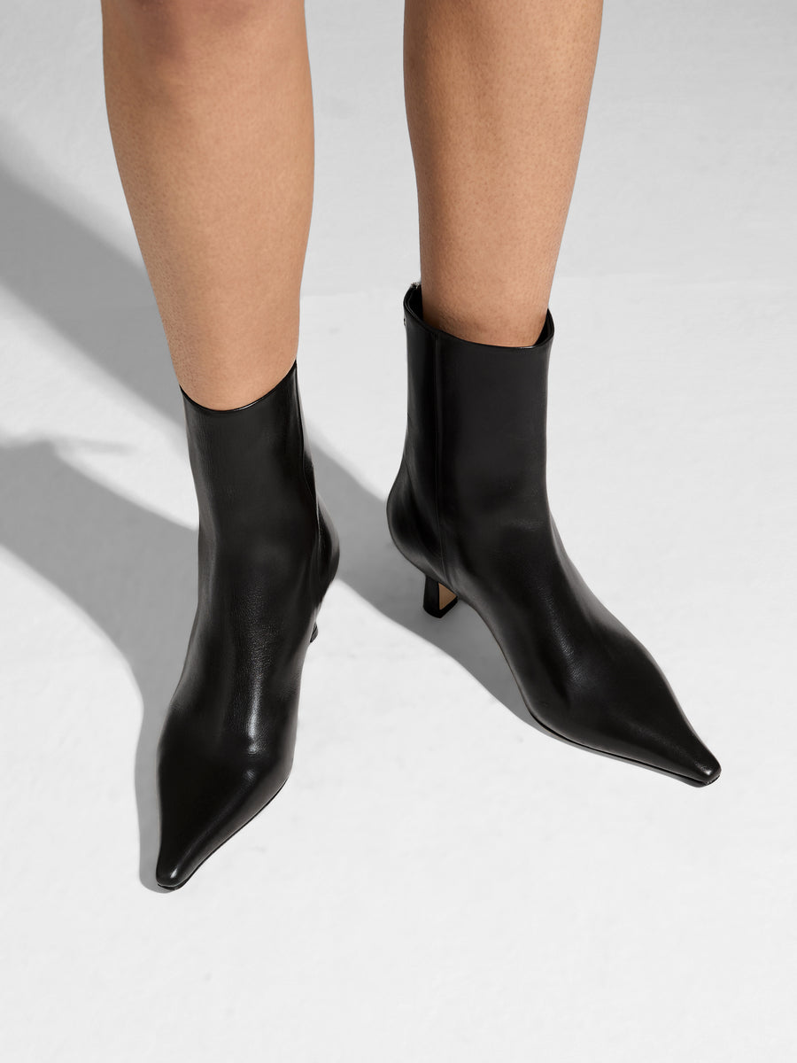 Aeyde | Rowan Leather Ankle Boots for Women | Black Calf | Pointed Toe | Mid Heel | On Feet
