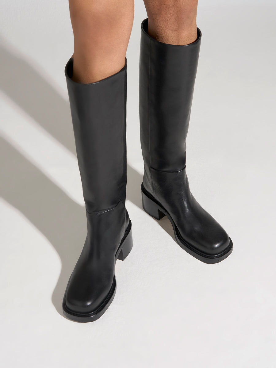 Aeyde | Taito Leather Knee High Boots for Women | Black Calf | Square Toe | Mid Heel | On Feet